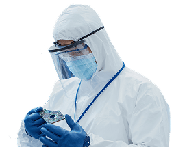 A lab technician examining a microprocessor.