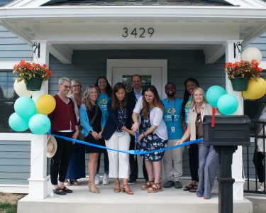 Liberty Resources’ Chief Executive Officer Kelli Harris and Director of Crisis Residence Marget Rhode cut the ribbon to celebrate the completion of renovations to its Onondaga County Crisis Residence.