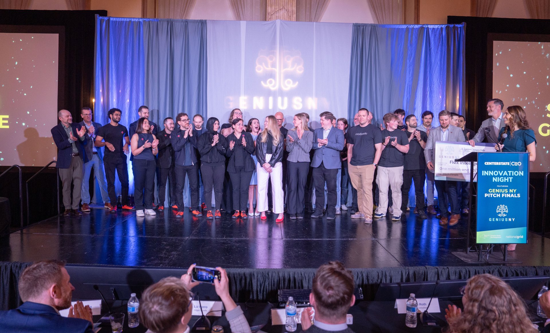 Group on stage at Innovation Night